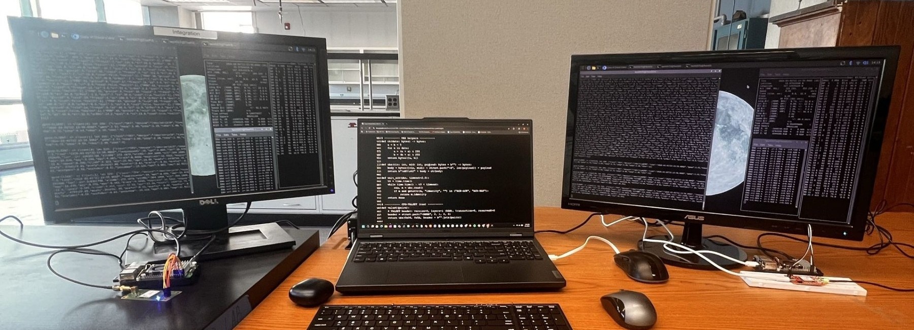 Robotics development workstation with multiple displays and embedded hardware