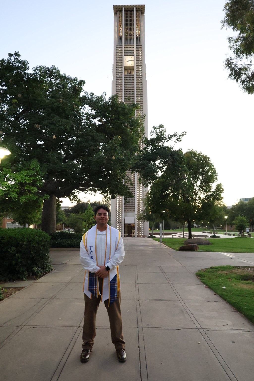 David Vidrio standing in front of the UC Riverside Bell Tower